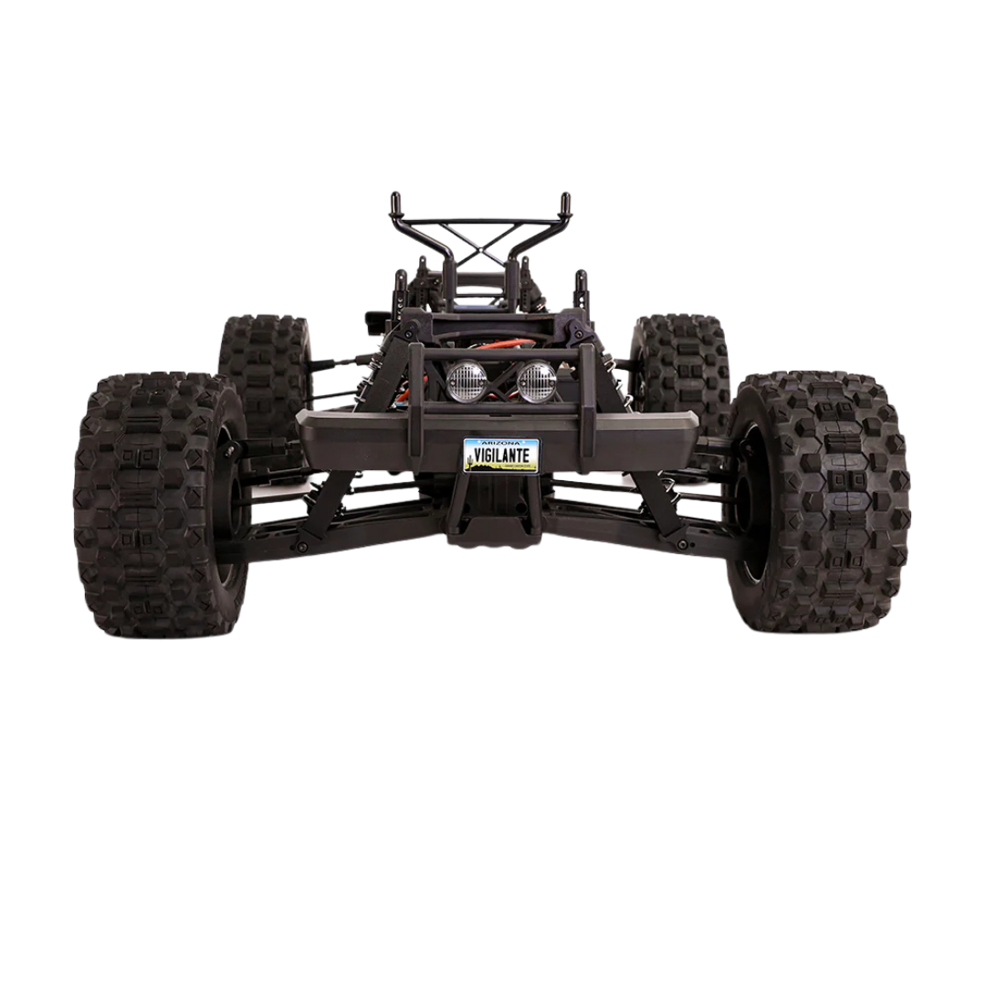 Black off-road vehicle chassis with large tires on a white background