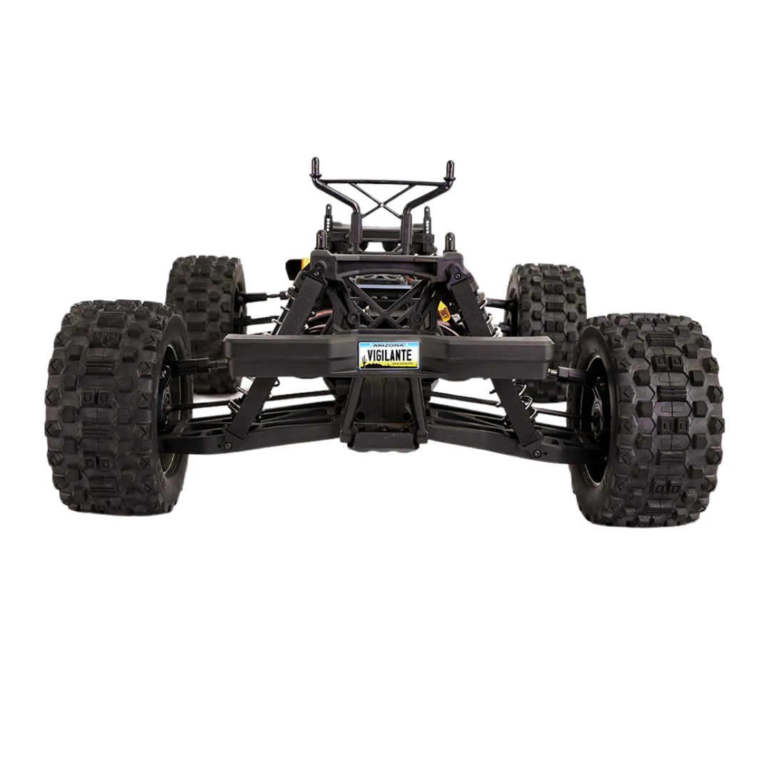 Black off-road vehicle chassis with large tires on a white background