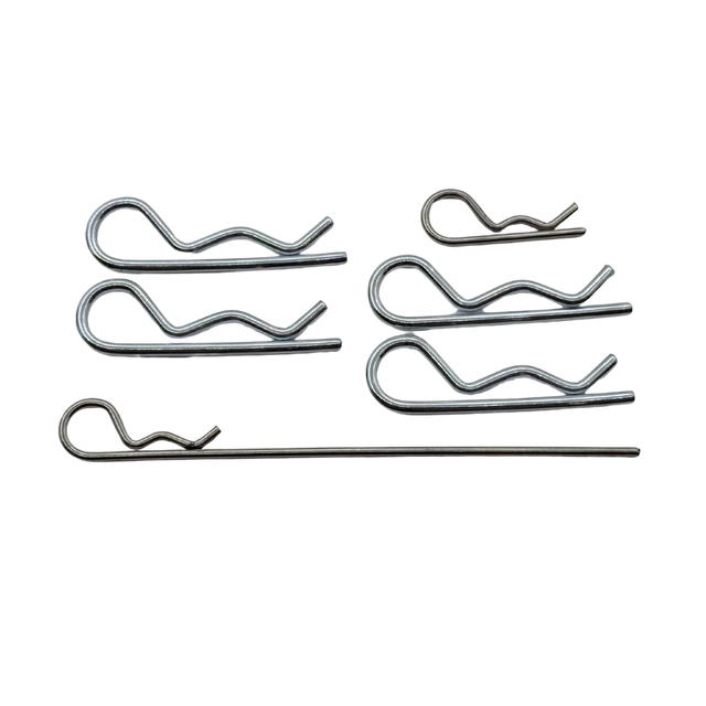Set of metal spring clips on a white background
