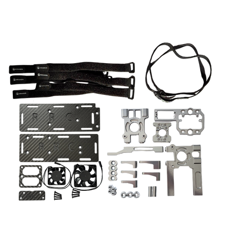 Collection of mechanical parts and tools on a white background