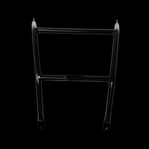 Black metal bracket on a black background
