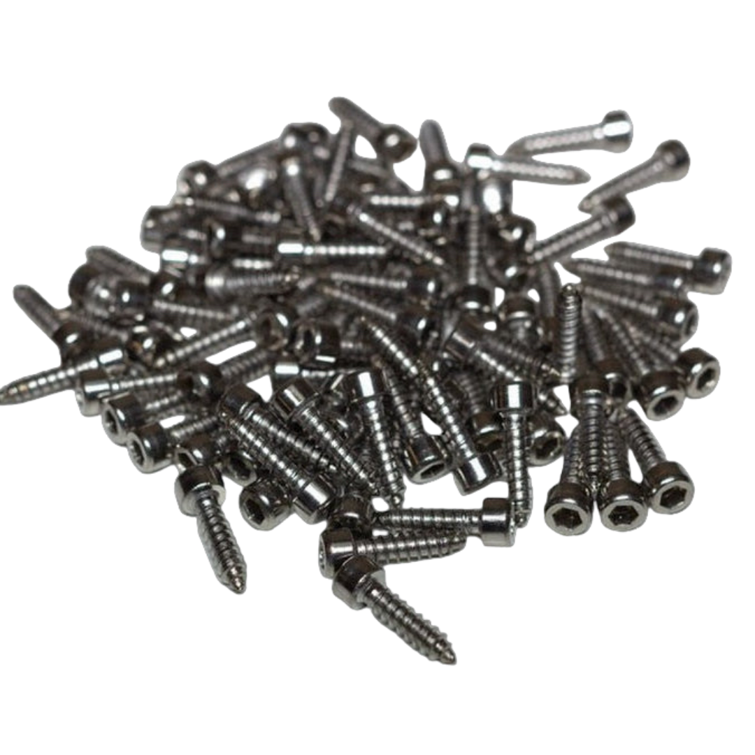 Pile of metal screws on a white background