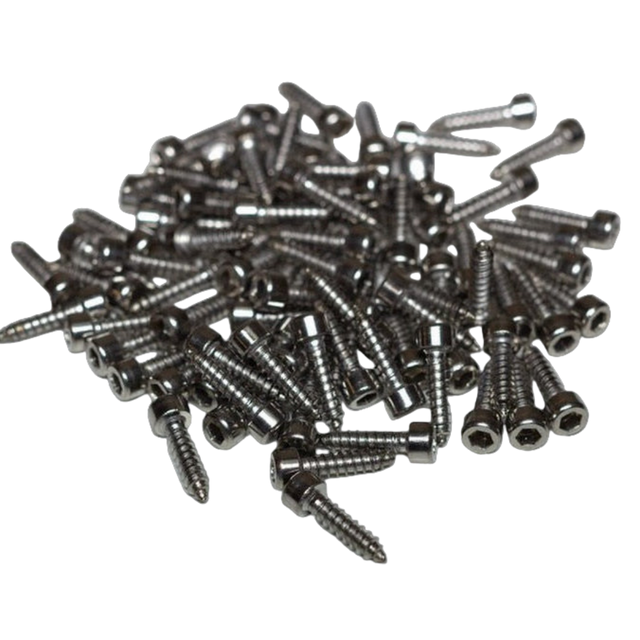 Pile of metal screws on a white background