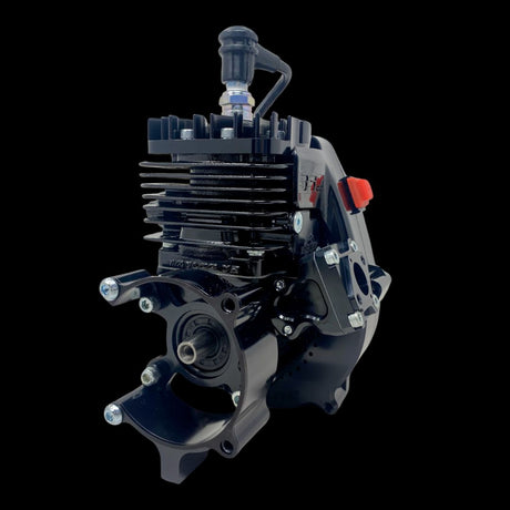 A blacked out TAYLOR 35cc V2 Billet Reed Engine, showcasing its anodized finish and billet parts.