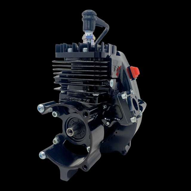 A blacked out TAYLOR 35cc V2 Billet Reed Engine, showcasing its anodized finish and billet parts.