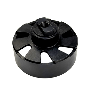Black metal component with central threaded hole on a white background