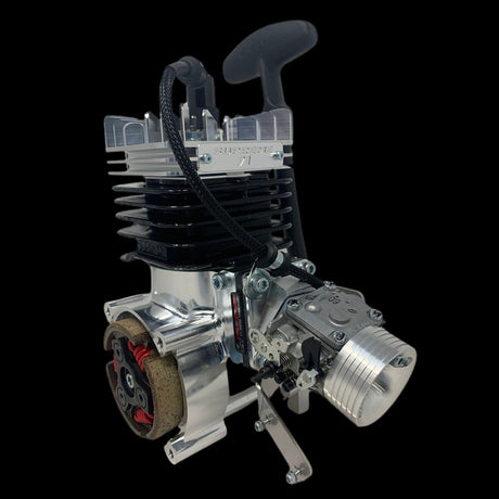 A 71cc billet reed engine with various components such as clutch system, ignition system, and exhaust system, predominantly in metallic colors.