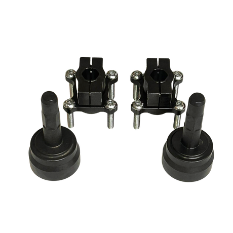 A set of four black metal mechanical components, including two central mounting brackets with silver screws
