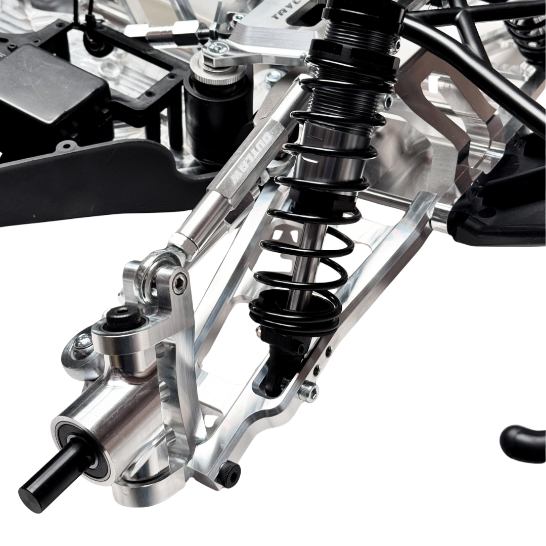 Taylor RC Complete Outlaw V4 Billet Hybrid Slider, close-up of the front suspension arm, shock, and wheel hub