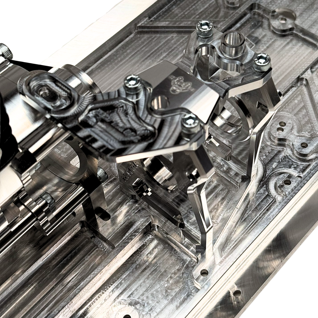 Close-up of a mechanical device with metal components on a white background