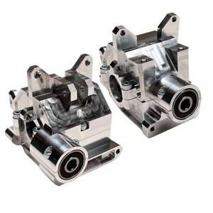 Two metallic mechanical components on a white background