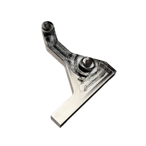 Taylor RC OUTLAW clutch side engine brace in raw silver, top view of the machined pocketed face with the mounting holes and thick base