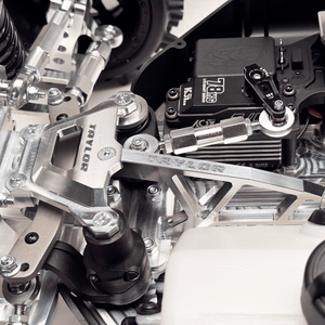 Close-up of a mechanical engine with visible branding on components.
