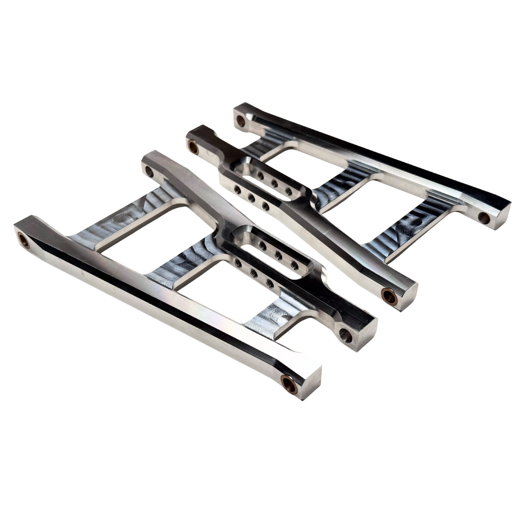 Two metal suspension arms on a white background