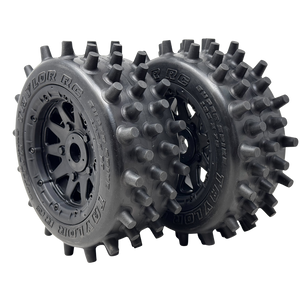 Two Taylor RC tires with spiky tread pattern on a white background