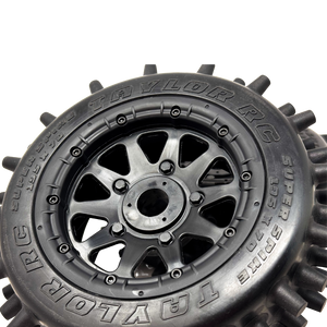 Close-up of a Taylor RC tire and rim on a white background