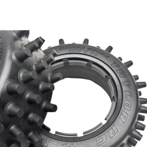 Close-up of a Taylor RC tire with tread pattern on a white background