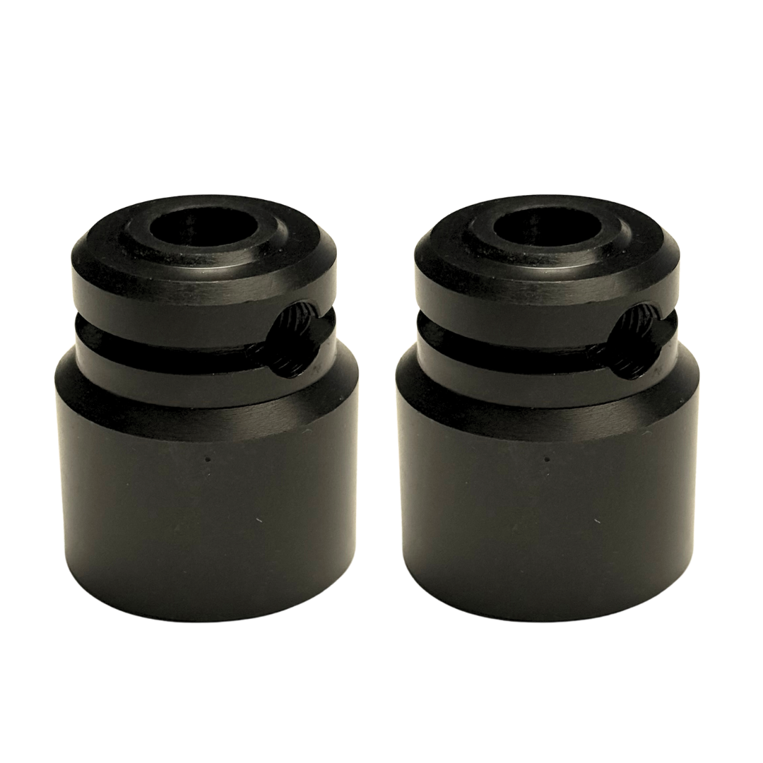 Two black cylindrical metal mounting blocks with threaded ends and a small side adjustment slot, shown on a plain white background.