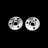 Two metal MCD shock pistons with TZZ logo on a black background