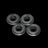 Four metallic rings with 'TZZ' branding on a black background
