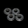 Four metallic rings with 'TZZ' branding on a black background