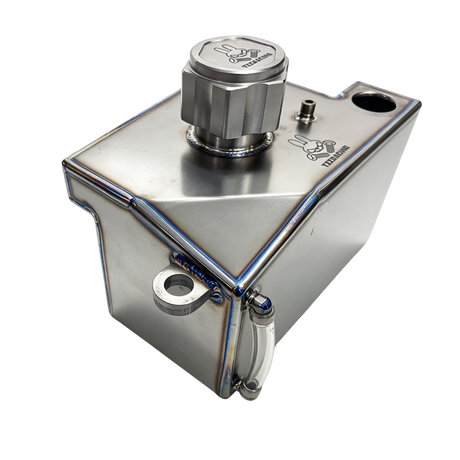 TZZ Racing titanium fuel tank for MCD, angled view showing the cap and mounting points