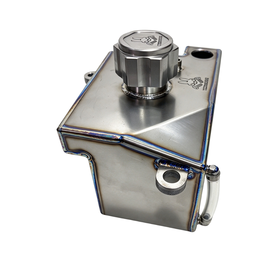TZZ Racing titanium fuel tank for MCD, end view showing the cap and clear side tube