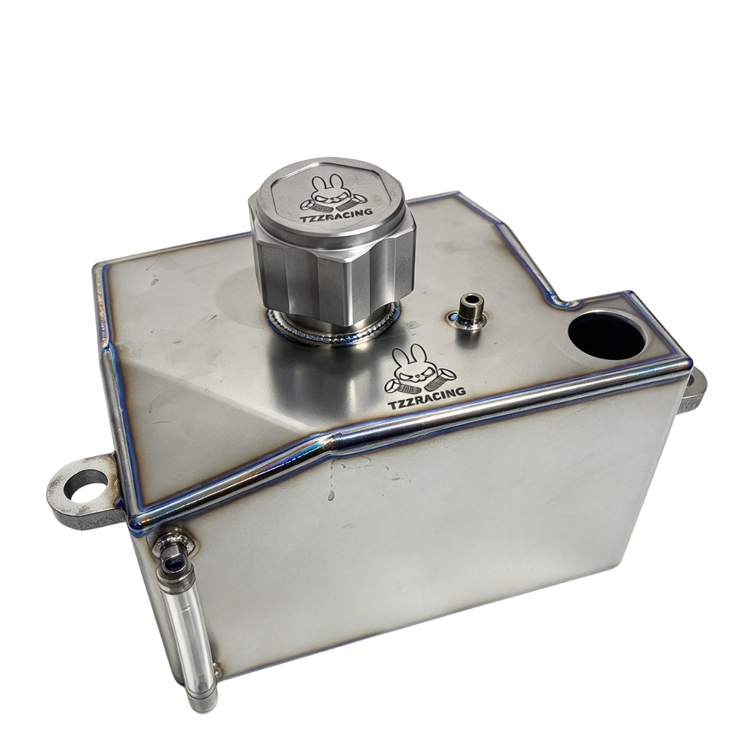 TZZ Racing titanium fuel tank for MCD, side view showing the cap and welded seams