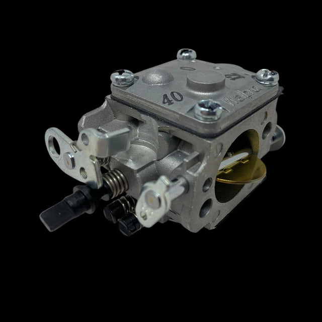A new Walbro WJ146 Extreme Carb, which is a replacement for the WJ71 carburetor, with visible adjustments and fuel intake.